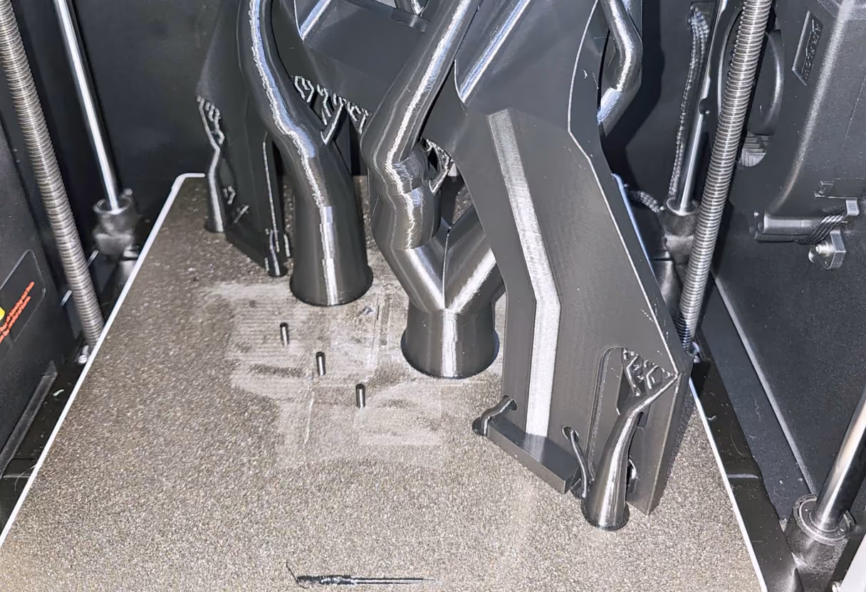 A batch of 3D printed automotive transmission mount prototypes